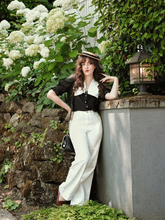 a lady wears a black tencel patchwork lapel shirt
